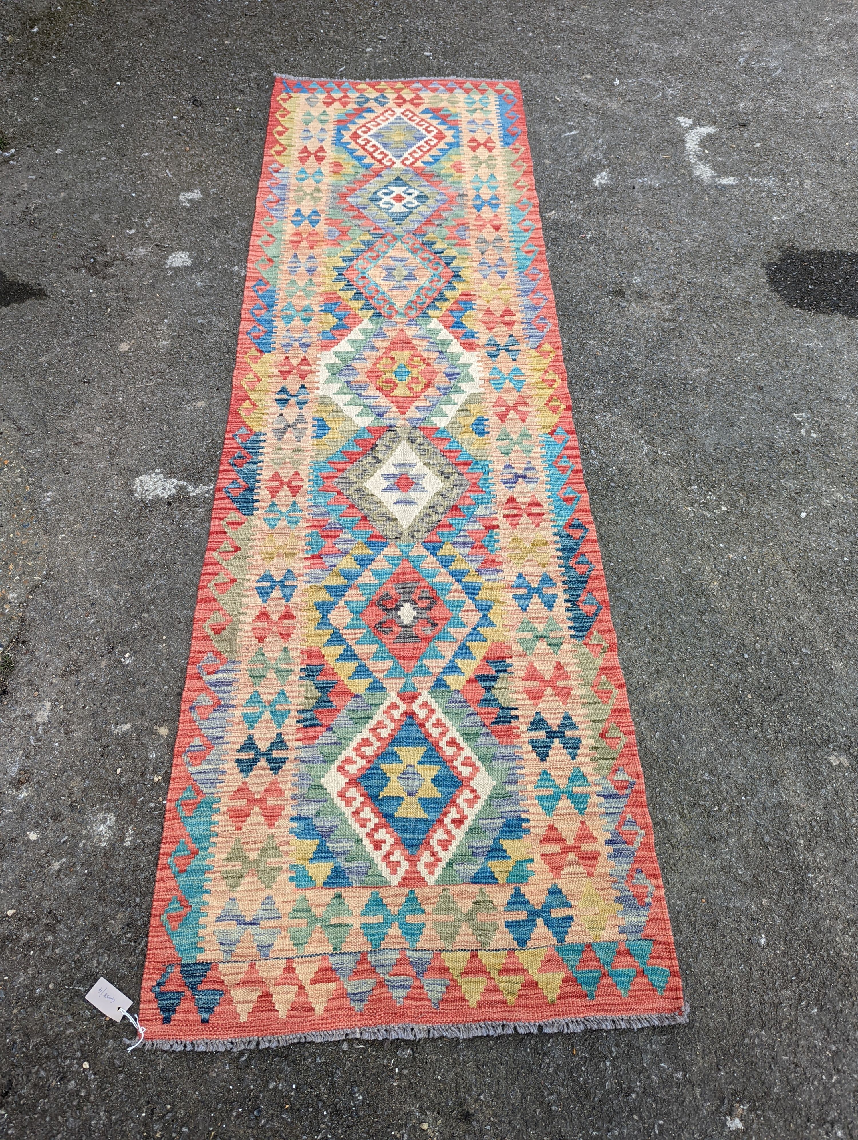 A contemporary Anatolian design Kilim flatweave runner, 290 x 85cm